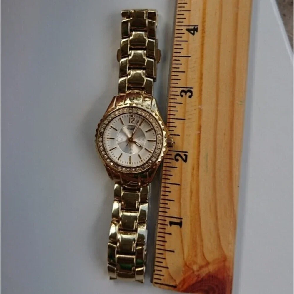Guess Analog gold tone with rhinestones Watch
